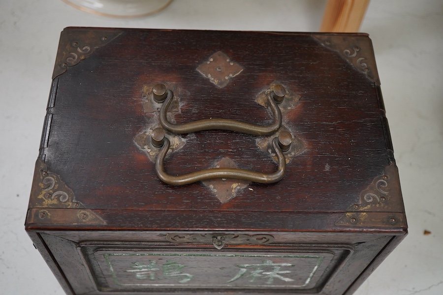 A Chinese bone and bamboo Mah-Jong set, 24cm wide